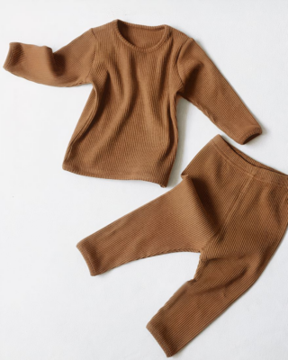 Boys' two-piece brown cotton pajamas with white background