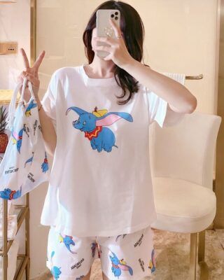 Dimbo elephant printed satin summer pajamas with a bag worn by a woman