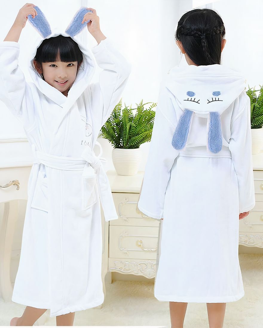 High quality white cotton bunny pajamas for children worn by a little girl in a house