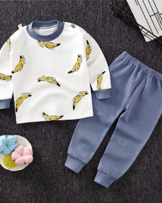 Cotton pajamas with banana pattern for children on a very high quality fashionable carpet