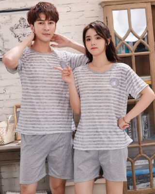 Two-piece pyjamas, grey striped white t-shirt and grey shorts for fashionable couple