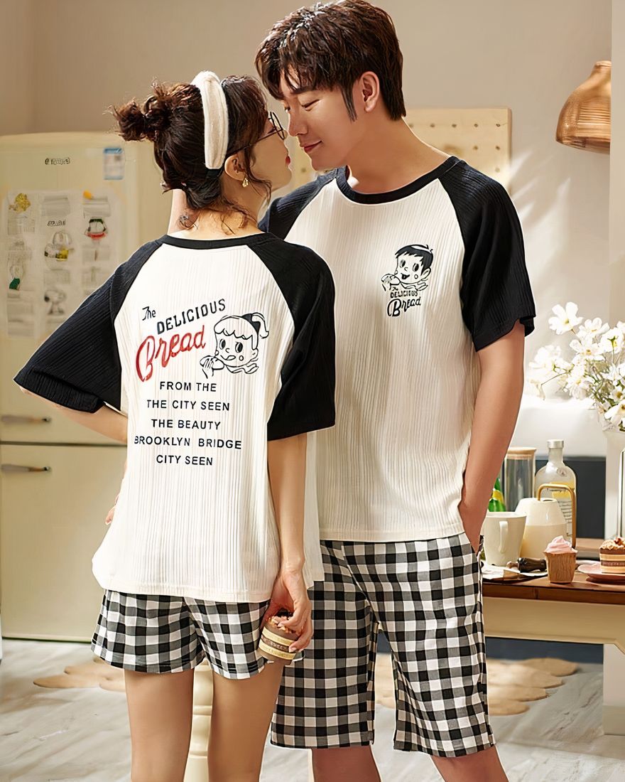 Two-piece t-shirt and cotton checkered shorts worn by a couple in a fashionable house