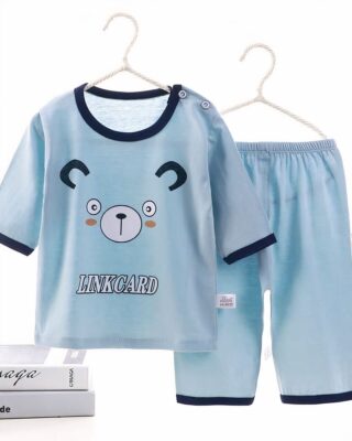 Blue cotton summer pajamas for kids with cat motif on a belt with books