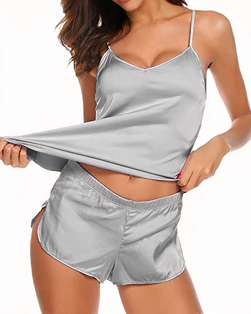 Gray polyester pajama set for women worn by a gray woman