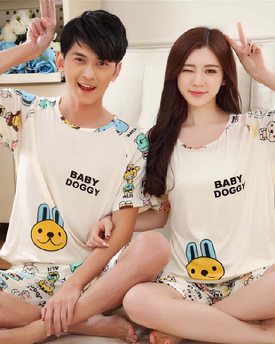 Nightwear for couple motif baby dog worn by a couple in a house