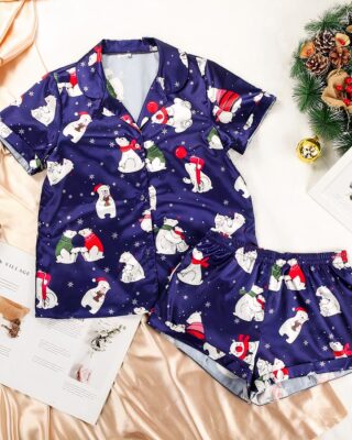 Blue christmas pajamas short sleeves and shorts for women very fashionable blue with a magazine as a decoration on the side