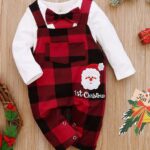 Christmas clothing set Bow tie for newborn boy 0 to 12 months on a table