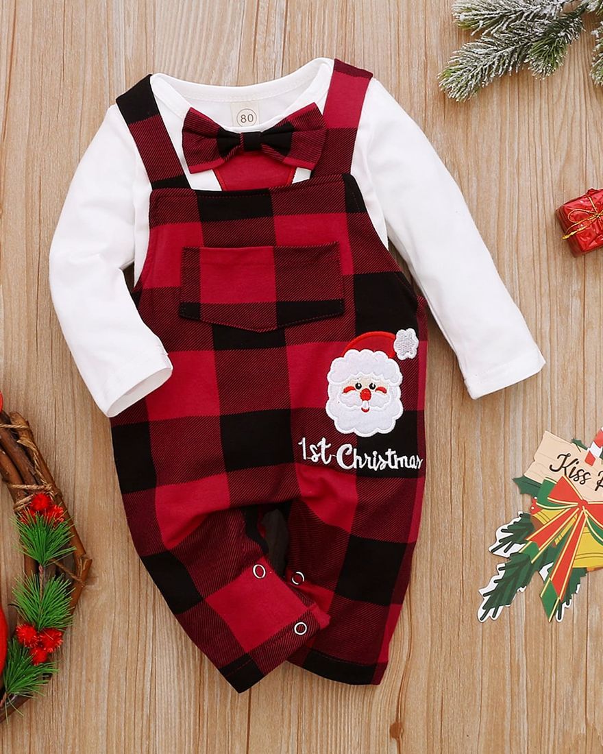 Christmas clothing set Bow tie for newborn boy 0 to 12 months on a table