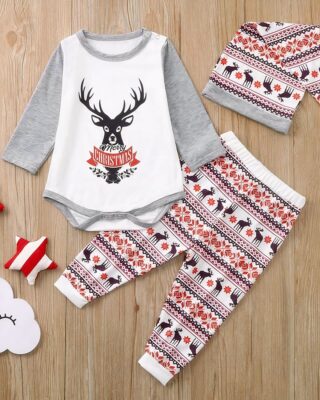 Christmas pyjama set for the whole family Christmas deer complete with hat on a table