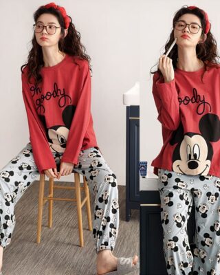 Women's Mickey pajama set worn by a woman wearing a headband sitting on a chair in a house