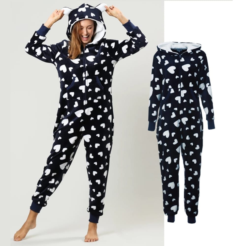 Women's pajama suit with hood and pockets black and white worn by a very comfortable and fashionable woman