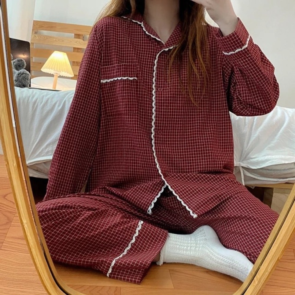 Women's retro plaid winter pajamas worn by a woman taking a picture in front of a mirror