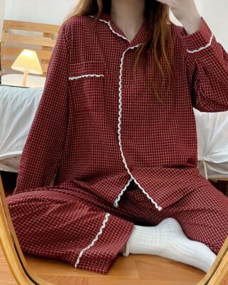 Women's retro plaid winter pajamas worn by a woman taking a picture in front of a mirror