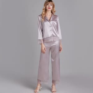 Chic lace and satin pajama set for women worn by a fashionable woman