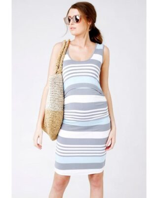 A brunette woman with sunglasses is pregnant and for a maternity and nursing dress with light blue, gray, and white horizontal stripes, the dress is sleeveless and the young woman carries a beige bag on her right shoulder