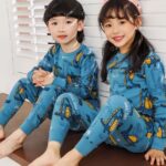 Spring blue dinosaur pajamas for kids with two kids wearing the pajamas