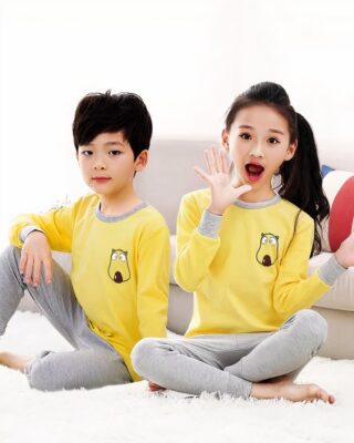 Spring pajamas with yellow sweater and gray pants for children with two children wearing the pajamas