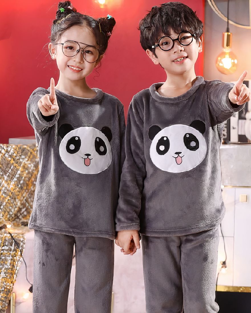 Two-piece long-sleeved panda pajamas worn by a little boy and a little girl in a house
