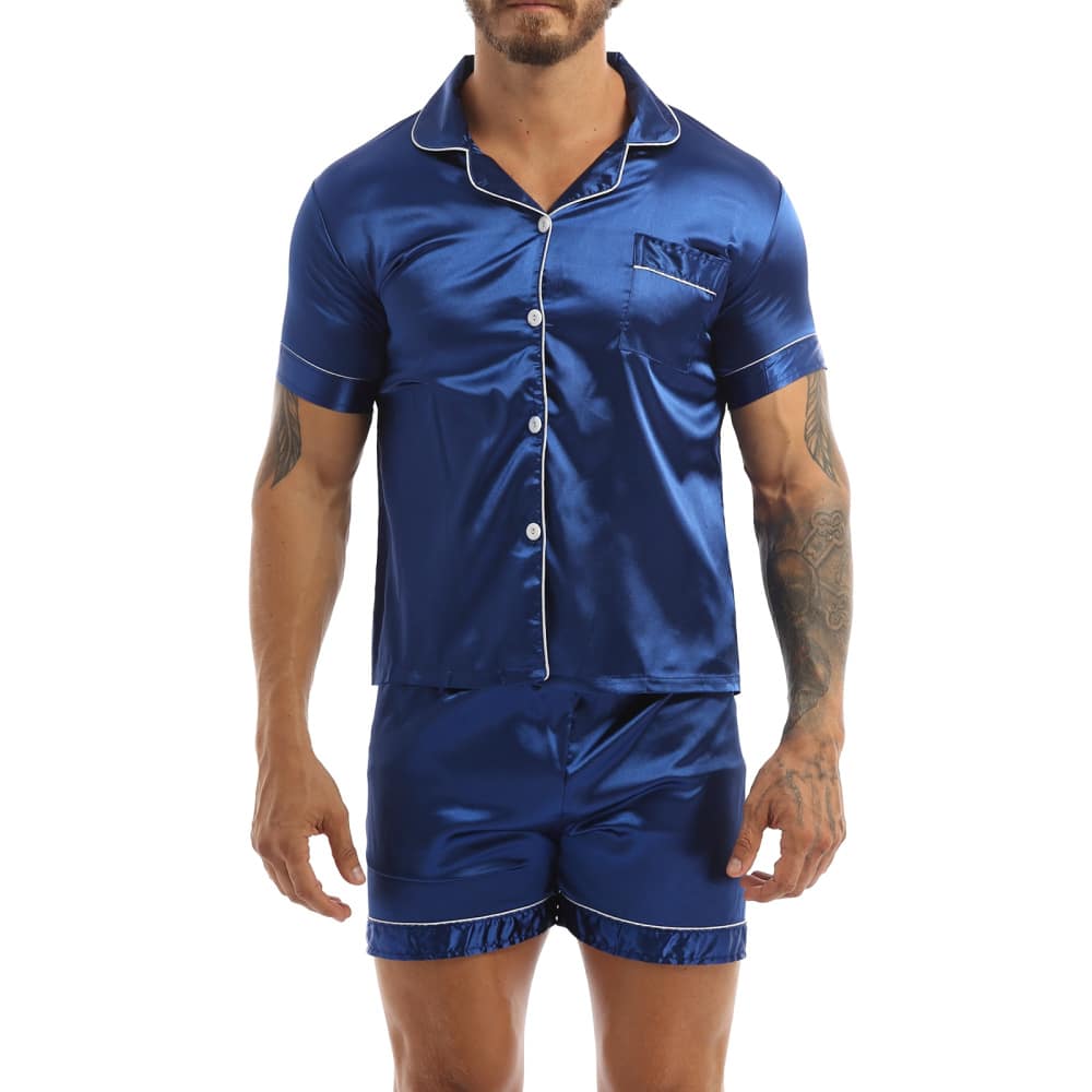 Pyjamas in red satin worn by a man tattooed on his left arm, the pyjamas are composed of shorts and a shirt with buttons on the front