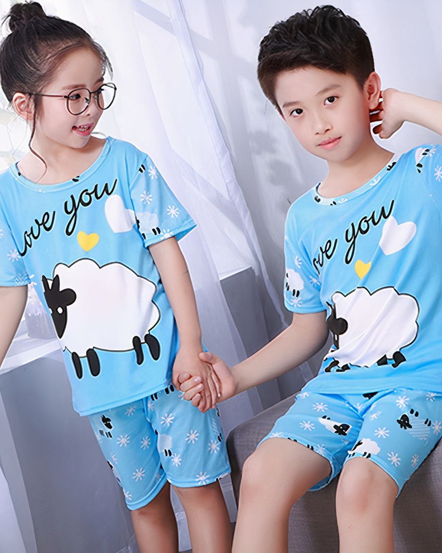 Blue short sleeve summer pajamas with Sheep print for children worn by children in a house