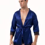 brown man wearing a navy blue short satin kimono pajamas with black lace trim and V-neck