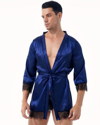 brown man wearing a navy blue short satin kimono pajamas with black lace trim and V-neck