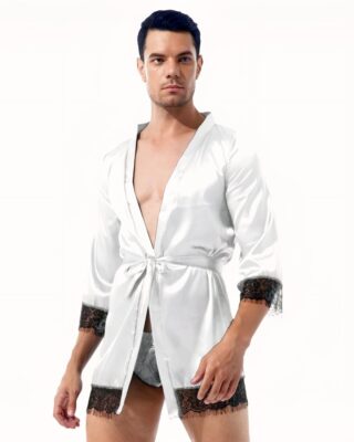 Man wearing a short white kimono pyjama with underwear underneath and black lace borders