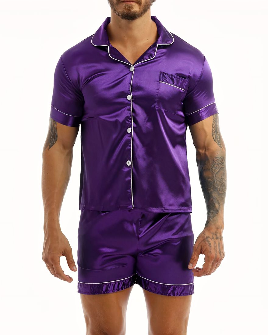 Purple satin pajamas worn by a man tattooed on his left arm, the pajamas are composed of shorts and a shirt with buttons on the front