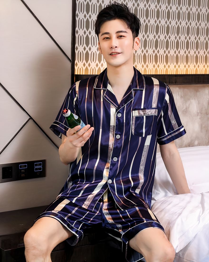 Short sleeve luxury pajamas with folded collar for men with a man wearing the pajamas with a background a room