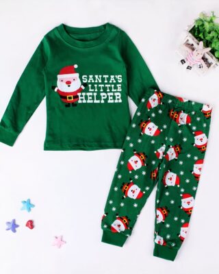 Santa's little helper" green pajamas with a white background and a plant with stars