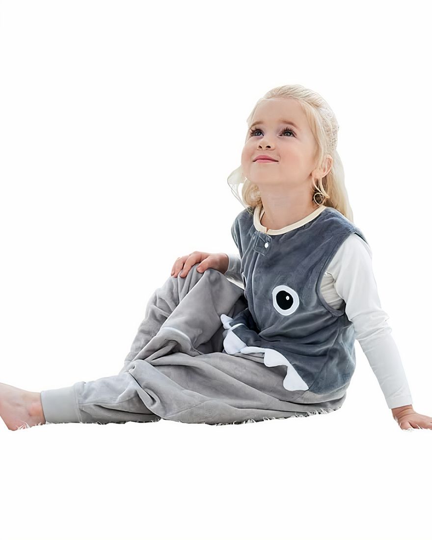 Soft jumpsuit for children in the shape of an animal in gray with a little one wearing the jumpsuit and a white background