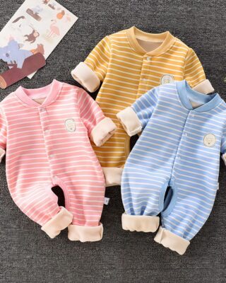 Striped baby romper in three different colors with a gray background