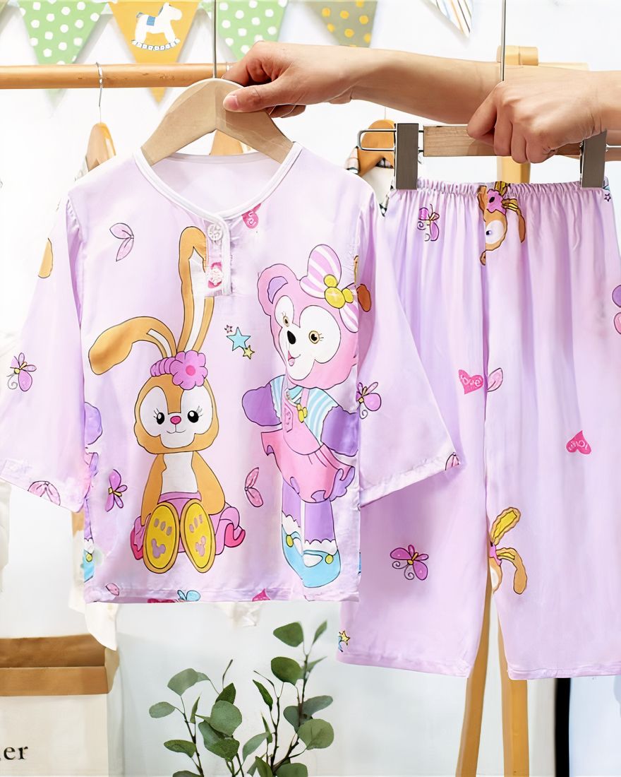 Cotton pajamas with monkey and purple rabbit on a belt in a house