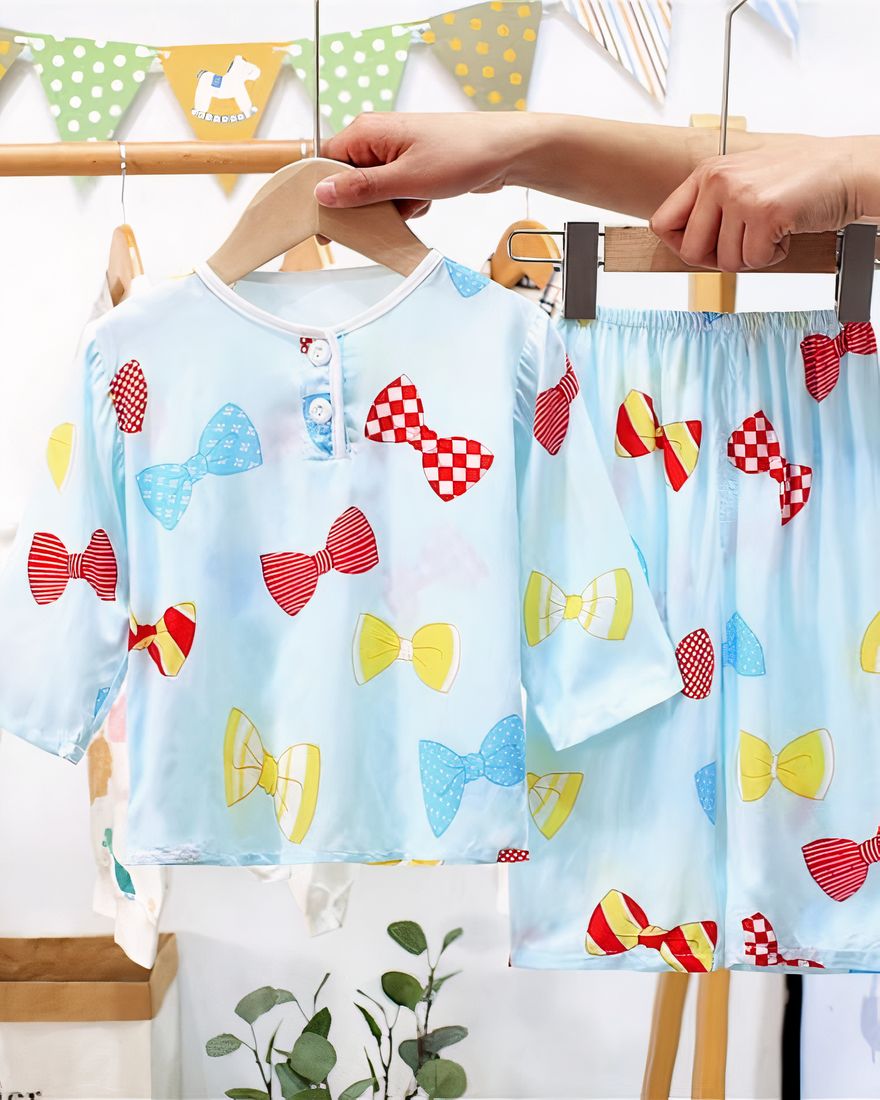Blue cotton pyjamas with blue and yellow bow print