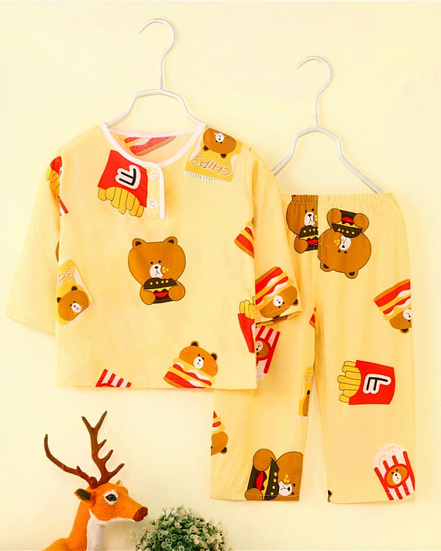 Yellow cotton pajamas with bear print on a hanger with half-length sleeves