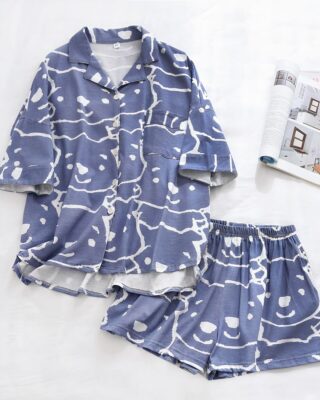 Two piece short sleeve summer pajamas with cartoon print and magazine on the side