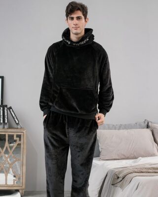 Black pyjamas for men with hood, it is worn by a tall and young man