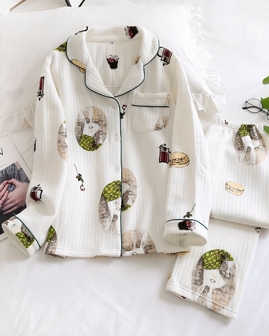 White cotton long sleeve pajamas with bunny print for winter fashion with a flower leaf on the side and a magazine