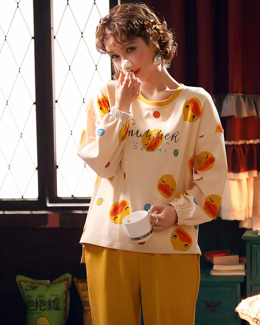 Long sleeve fall pajamas with duck print for women, worn by a woman