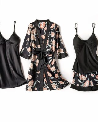 Women's four-piece black satin floral pajamas with white background