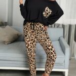 Women's leopard print pajamas, with a one bedroom background