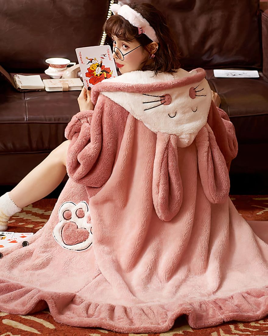 Women's long hooded fleece pajamas with pink bunny fur and sofa bottom