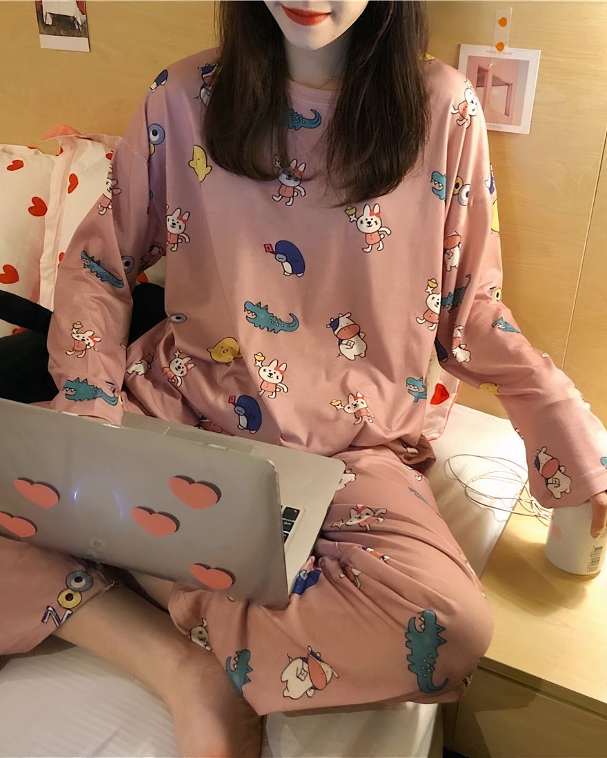 Women's long-sleeved fall pajamas with cartoon pattern worn by a woman