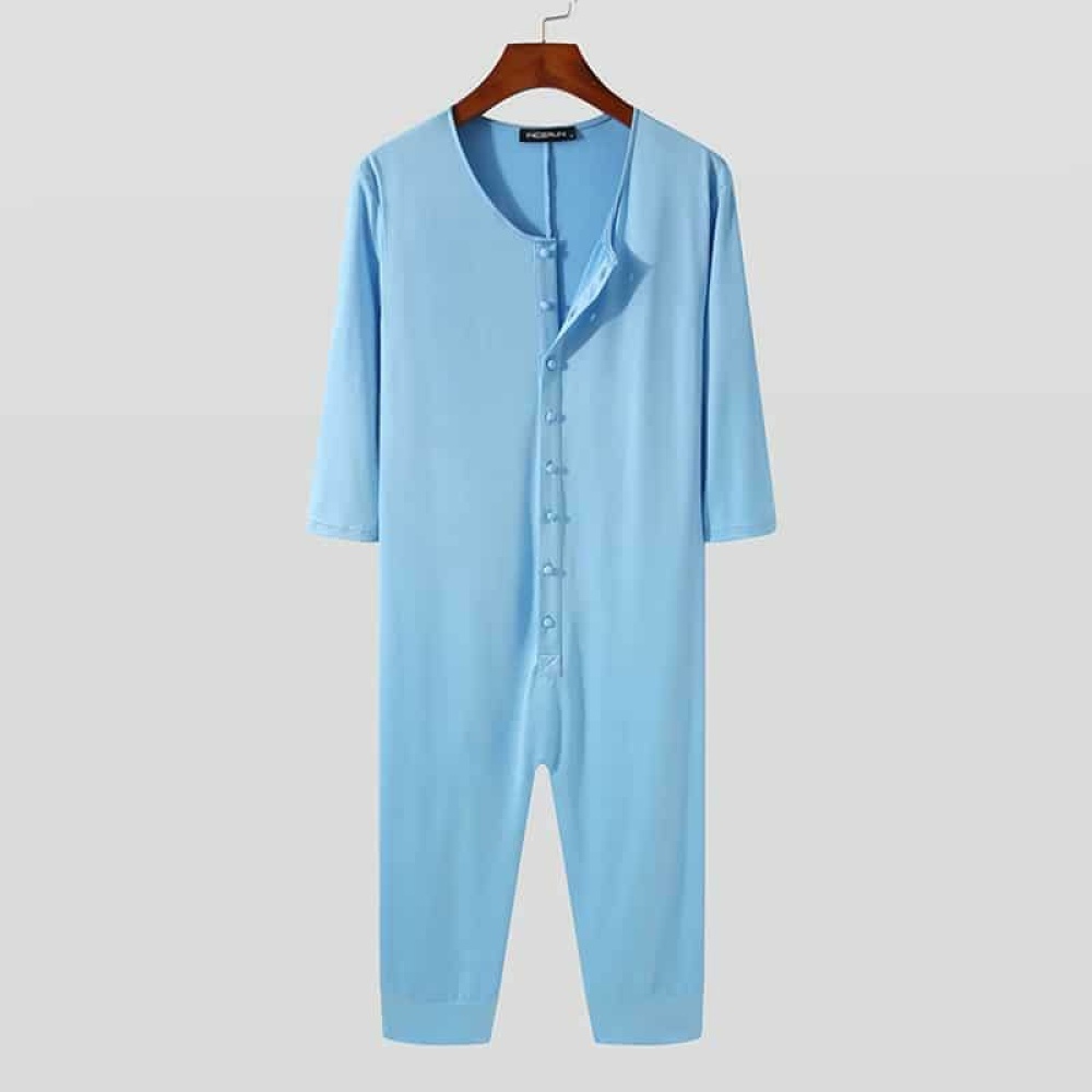 Blue pajama suit for men hanging on a hanger