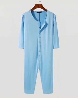 Blue pajama suit for men hanging on a hanger