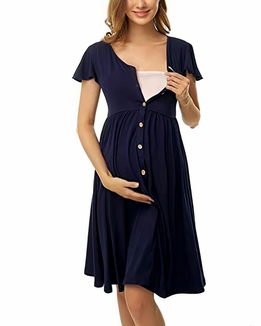 Blue pregnancy pajamas worn by a woman holding her stomach